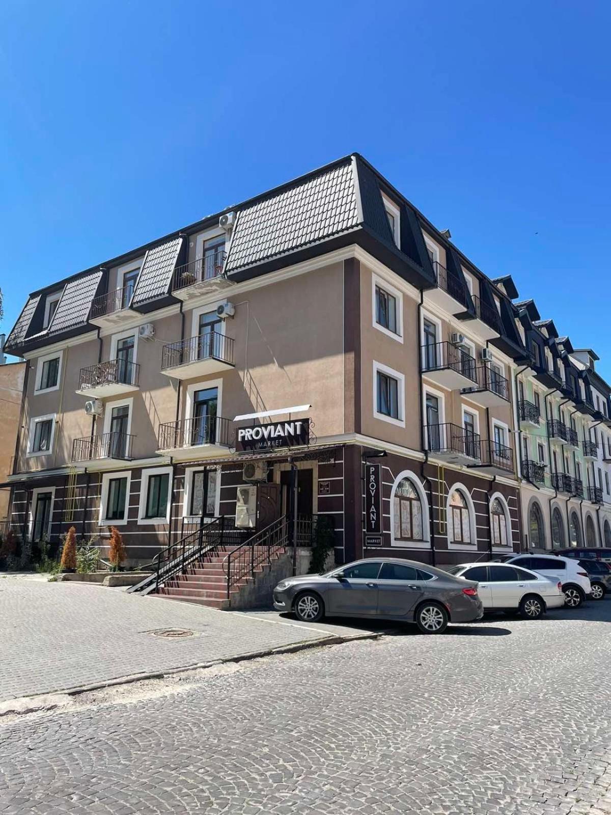 Ferienwohnung «Гори́Ще На Площі Польський Ринок» Kamjanez-Podilskyj Exterior foto